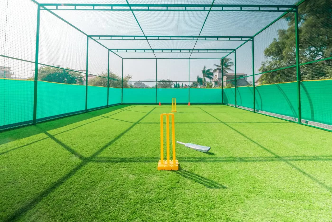 Cricket practice nets set up for batting and bowling drills